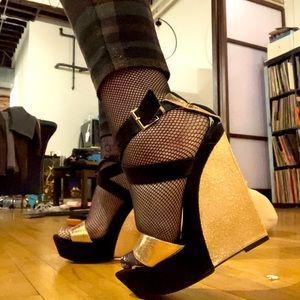 These fantastic avant-garde gold and black shoes
